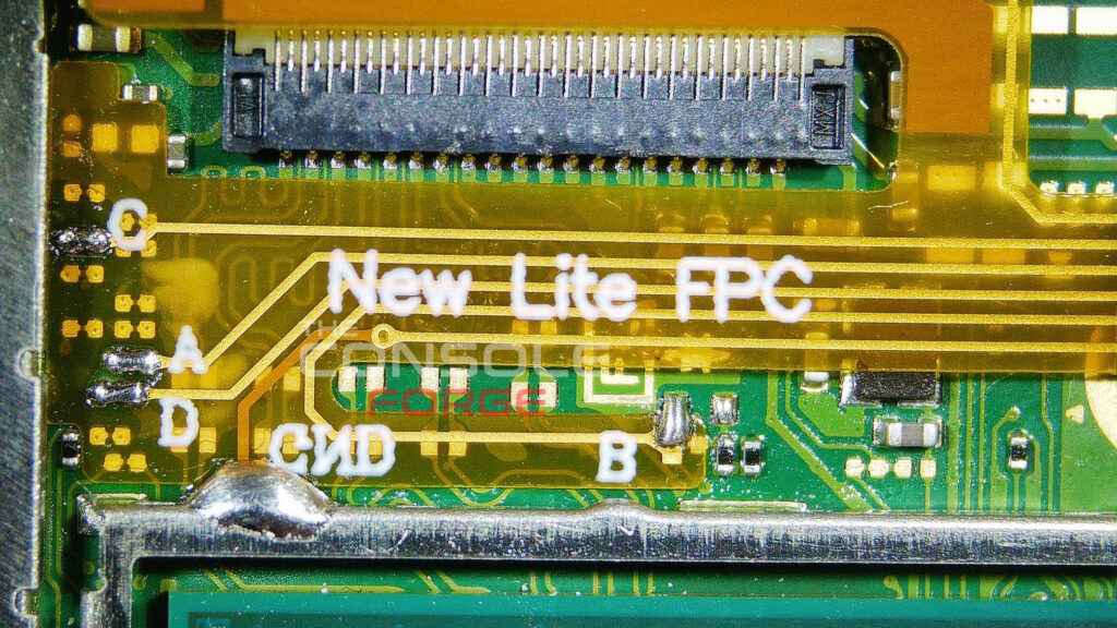 Nintendo Switch Lite motherboard showing the New Lite FPC ribbon cable soldered to the C (DAT0), A (CMD), D (CLK), B (RST), and GND installation points.